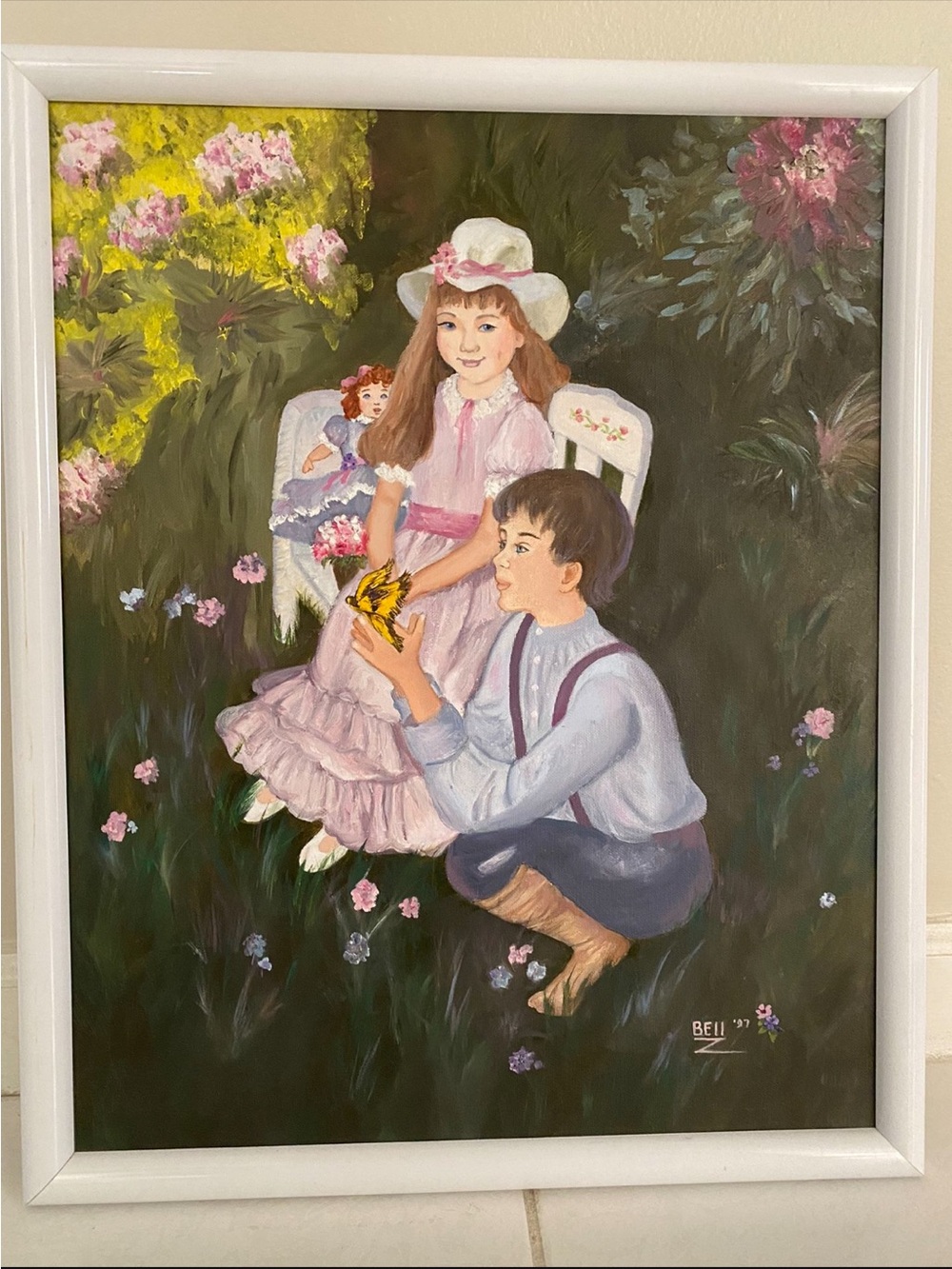 Original Acrylic Painting of Boy and Girl
in Garden in White Frame 18” X 22”